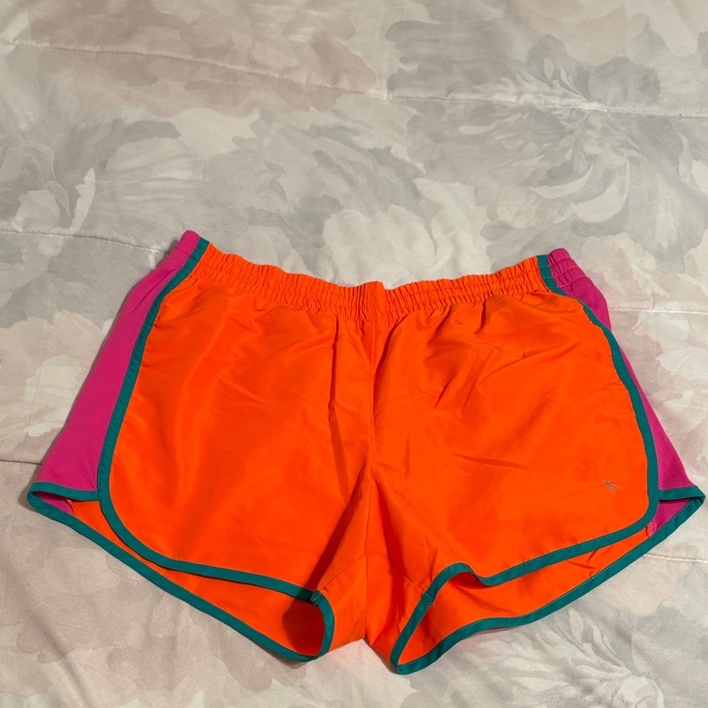 Danskin orange athletic shorts with lining & pocket